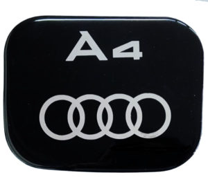 AUDI A4 4/5D 1995-2001  ΑΥΤΟΚΟΛΛΗΤΟ ΤΑΠΑΣ ΡΕΖΕΡΒΟΥΑΡ 18 x 14 cm ΜΑΥΡΟ/ΧΡΩΜΙΟ ΜΕ ΕΠΙΚΑΛΥΨΗ ΕΠΟΞΕΙΔΙΚΗΣ ΡΥΤΙΝΗΣ (ΥΓΡΟ ΓΥΑΛΙ) – 1 ΤΕΜ.